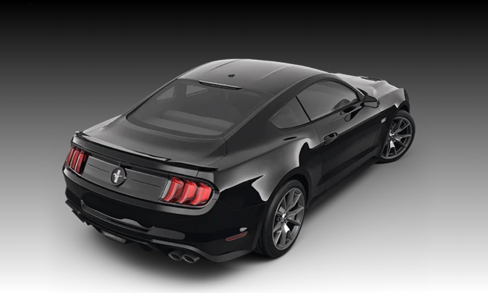 2023 Ford Mustang rear view with tri-bar LED taillights and dual exhaust system