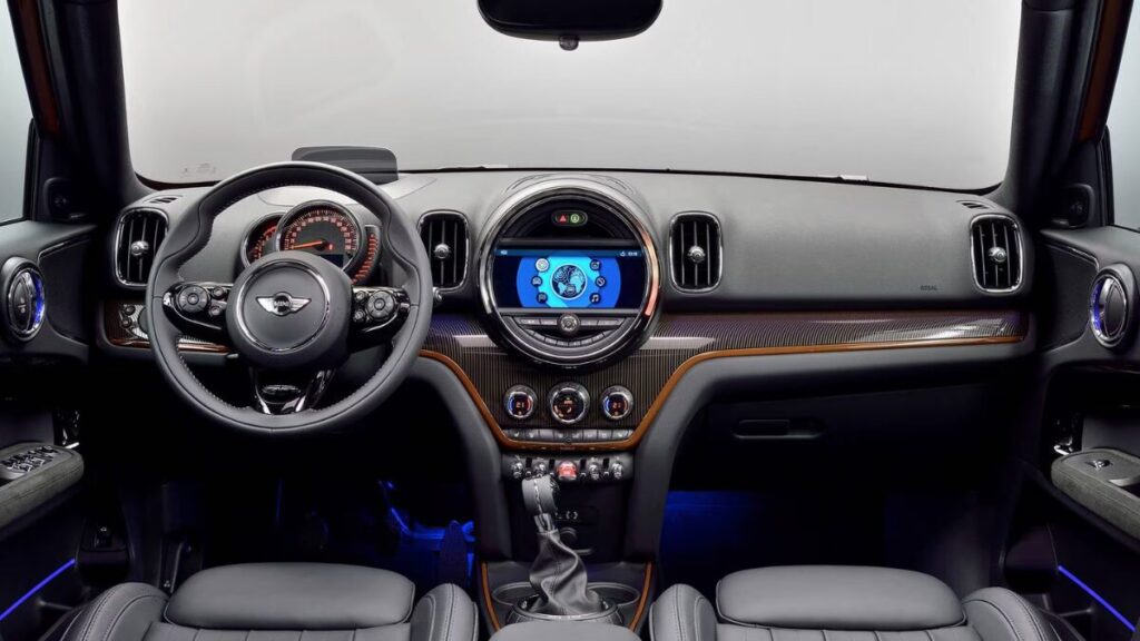 2018 MINI Countryman interior cabin with circular infotainment display and premium dashboard