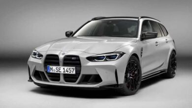 2023 BMW M3 Touring front view, massive kidney grille and aggressive M styling.