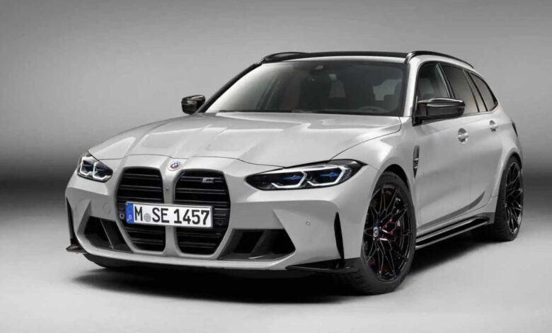 2023 BMW M3 Touring front view, massive kidney grille and aggressive M styling.