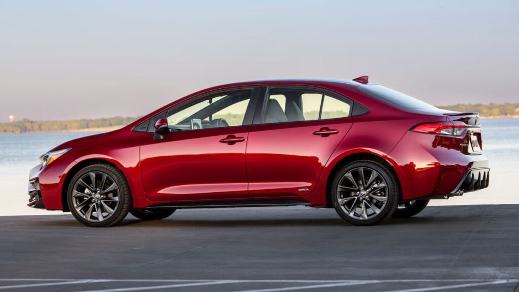 Side profile of the 2023 Toyota Corolla SX Hybrid hatchback with privacy glass