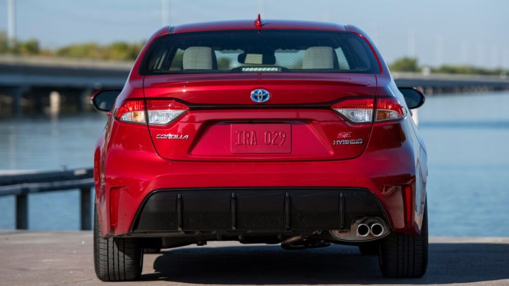 Rear view of the 2023 Toyota Corolla SX Hybrid showing tail lights and compact boot opening