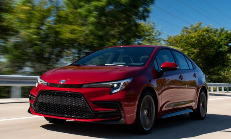 Front view of the 2023 Toyota Corolla SX Hybrid showing LED headlights and modern grille design