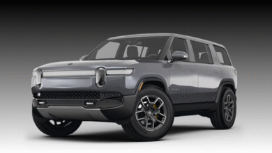 2022 Rivian R1S front view showcasing signature LED headlights and rugged SUV styling.