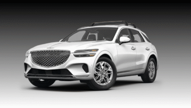 2023 Genesis Electrified GV70 front view with signature crest grille and LED headlights