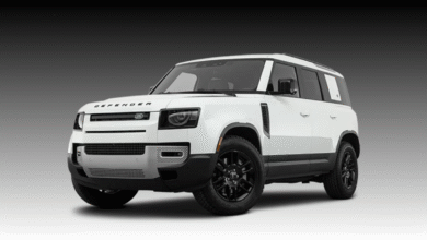 2023 Land Rover Defender 130 front view parked outdoors