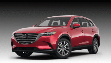 Alt Text: 2023 Mazda CX-9 front view in Soul Red Crystal Metallic