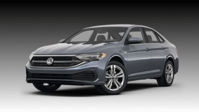 2023 Volkswagen Jetta GLI front view showing sporty grille and red exterior accents