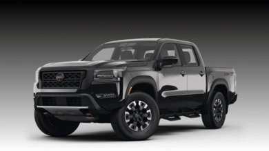2023 Nissan Frontier front view showing bold grille and LED headlights