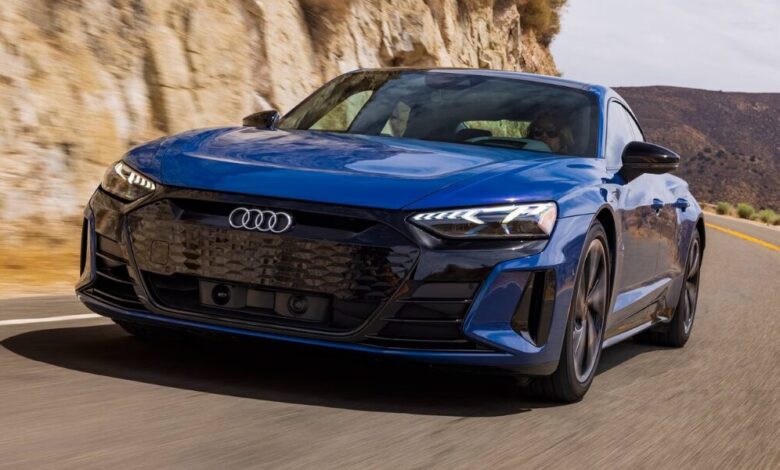 2022 Audi e-tron GT Sedan front view showcasing sleek headlights, aerodynamic design, and sporty electric styling