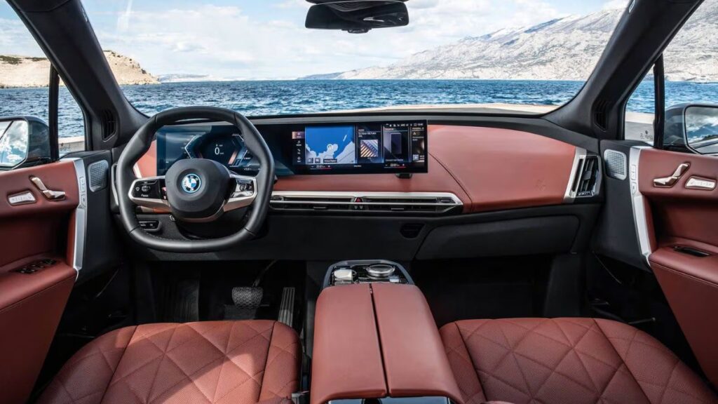 2023 BMW iX interior with curved display and premium luxury cabin