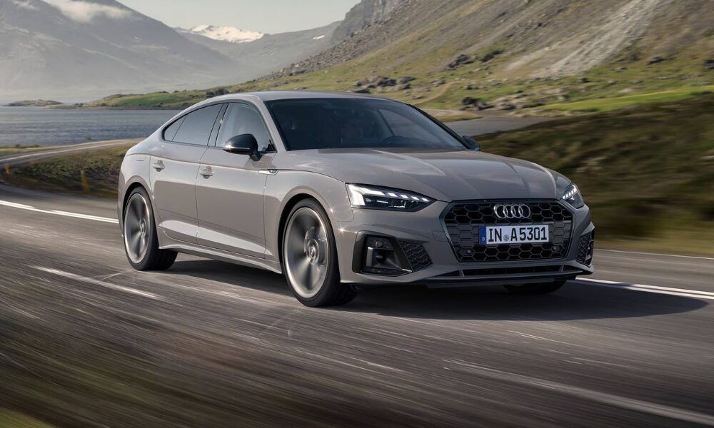 2023 Audi A5 front driving view on the road with daytime LED running lights