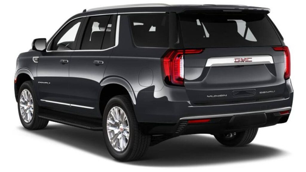 2023 GMC Yukon rear view, LED taillights and dual exhaust.