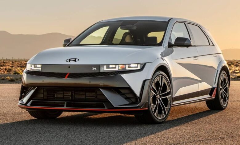 2025 Hyundai Ioniq 5 N front view, aggressive N mask grille and lower stance.