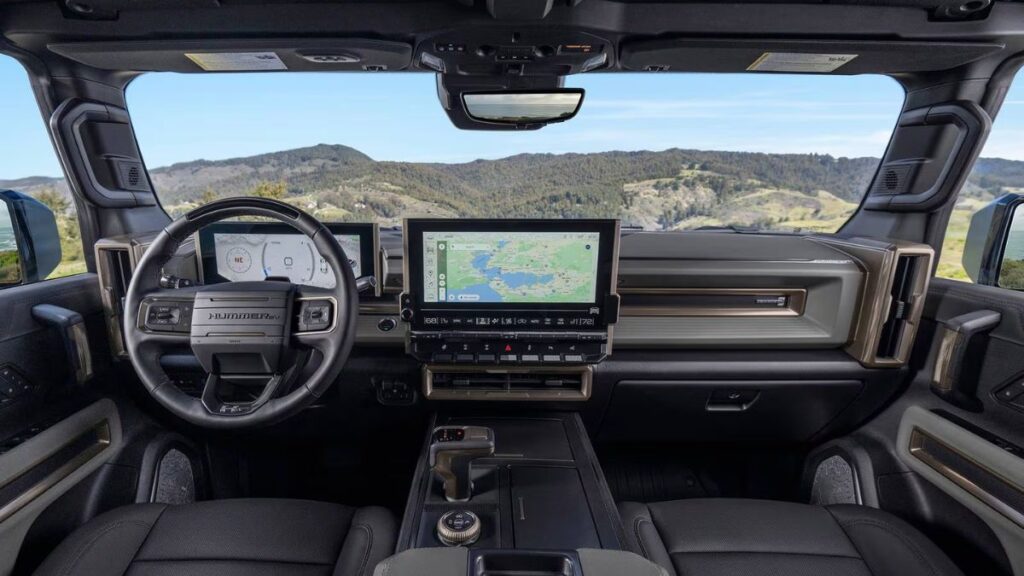 2024 GMC Hummer EV SUV interior, 13.4-inch touchscreen and digital cluster.