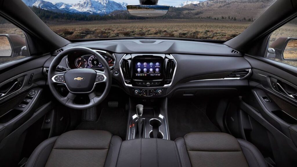 2023 Chevrolet Traverse interior featuring three-row seating and infotainment touchscreen