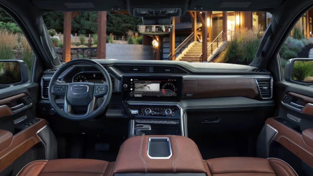 2023 GMC Sierra 1500 interior, driver-focused cockpit and large touchscreen.