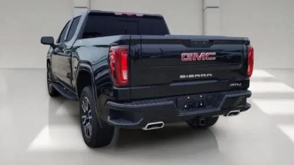 2023 GMC Sierra 1500 rear view, MultiPro tailgate and LED taillights.