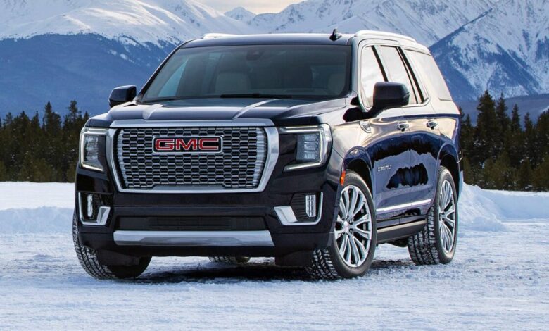 2022 GMC Yukon front view showcasing grille, headlights, and bold SUV design