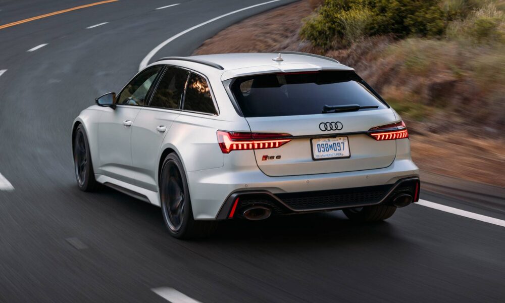 2024 Audi RS 6 Wagon rear view highlighting LED taillights, sporty diffuser, and wide stance