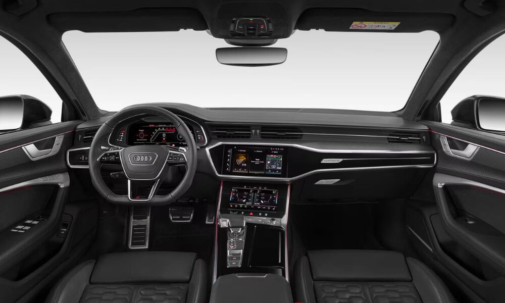 2024 Audi RS 6 Wagon interior showing digital cockpit, premium materials, and sport seating
