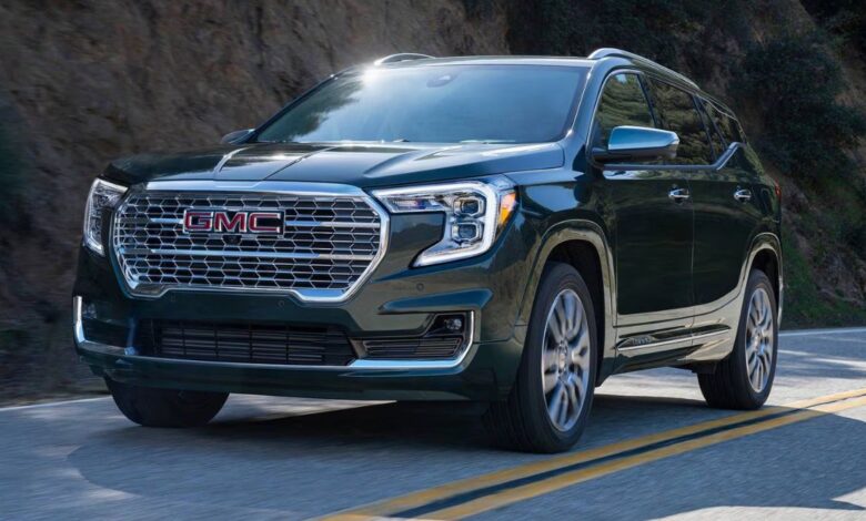 2024 GMC Terrain front view, bold grille and LED headlights.