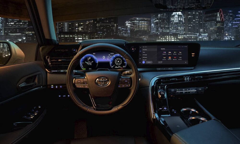 Cabin interior of the 2025 Toyota Mirai with modern tech and luxury materials.