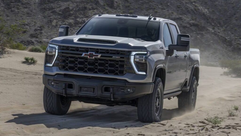 Front view highlighting the bold grille, raised hood, and signature lighting that define Chevrolet’s modern truck identity.