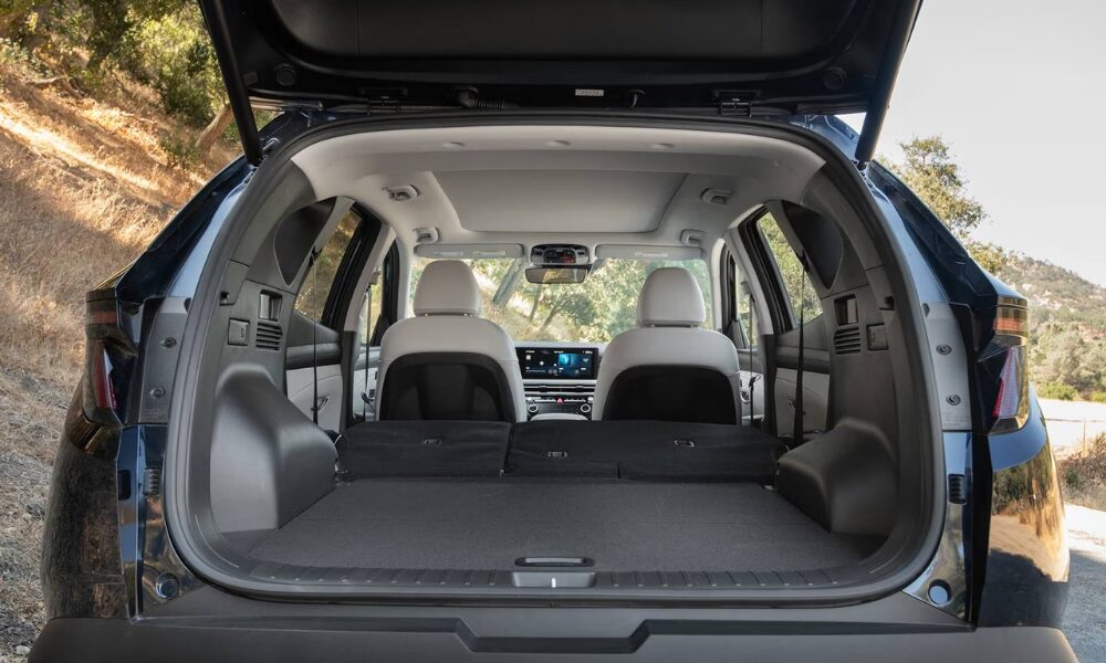 2025 Hyundai Tucson cargo area with seats up showing spacious trunk capacity