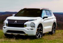 2025 Mitsubishi Outlander PHEV front view showcasing modern grille and LED headlights