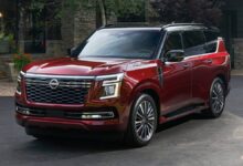2025 Nissan Armada front view SUV with updated grille and LED headlights