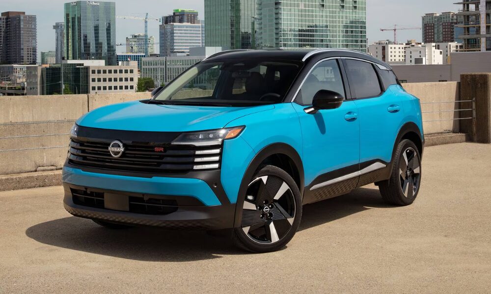 2025 Nissan Kicks front view showing bold grille and modern LED headlights