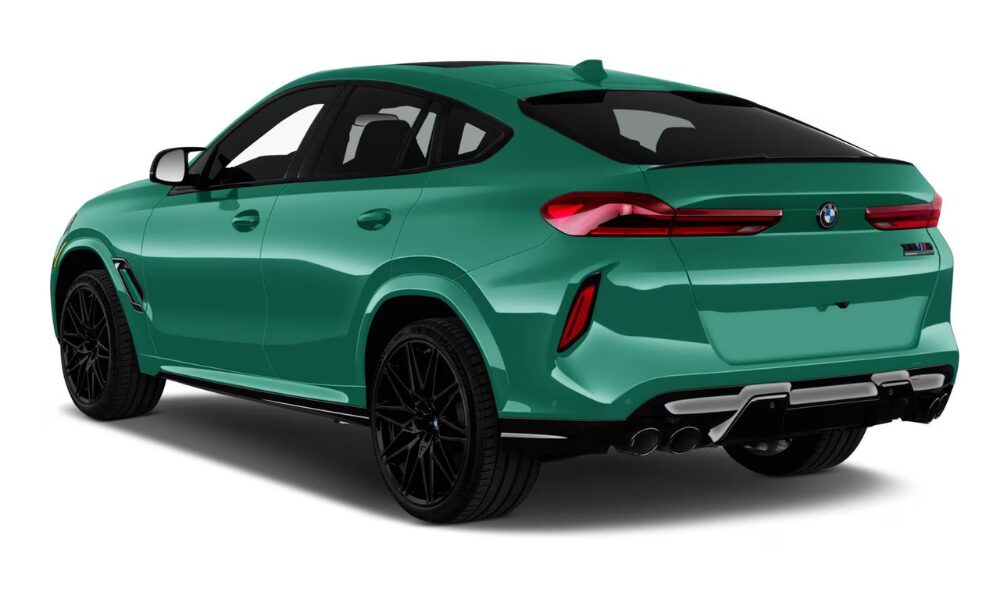 2026 BMW X6 M rear exterior showcasing quad exhausts and sporty rear design.