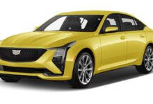 2026 Cadillac CT5 front view with LED headlights and wide black grille.