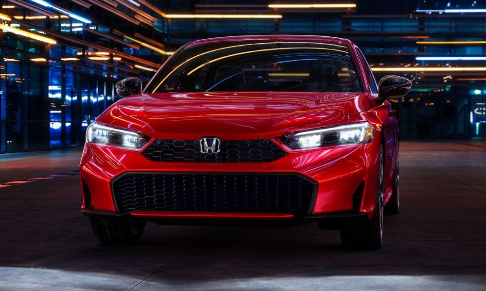 Front view of the 2026 Honda Civic Sedan showcasing the updated grille and LED headlights.