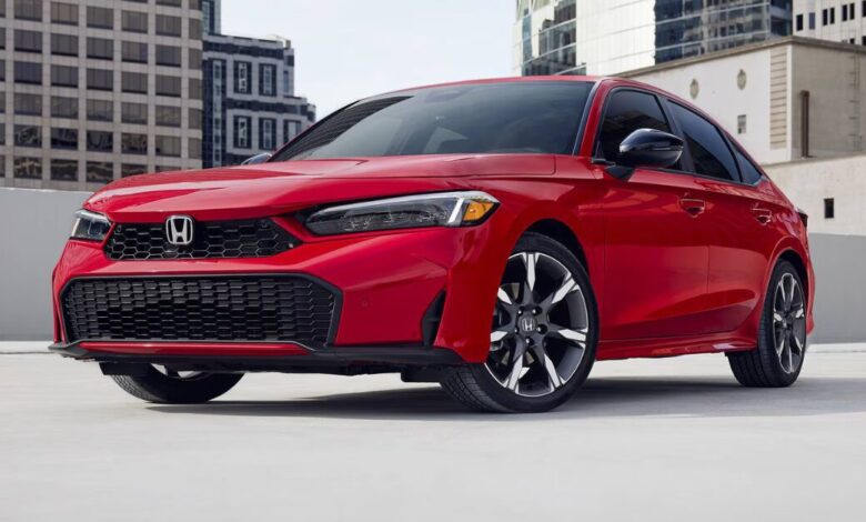 Front view of the 2026 Honda Civic Sedan showcasing the updated grille and LED headlights.