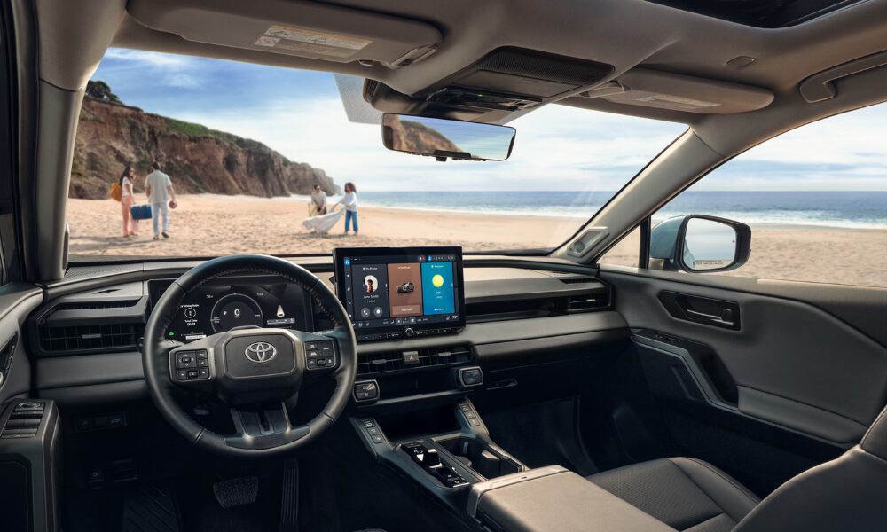 2026 Toyota RAV4 interior showing dashboard layout, steering wheel, and center touchscreen display.