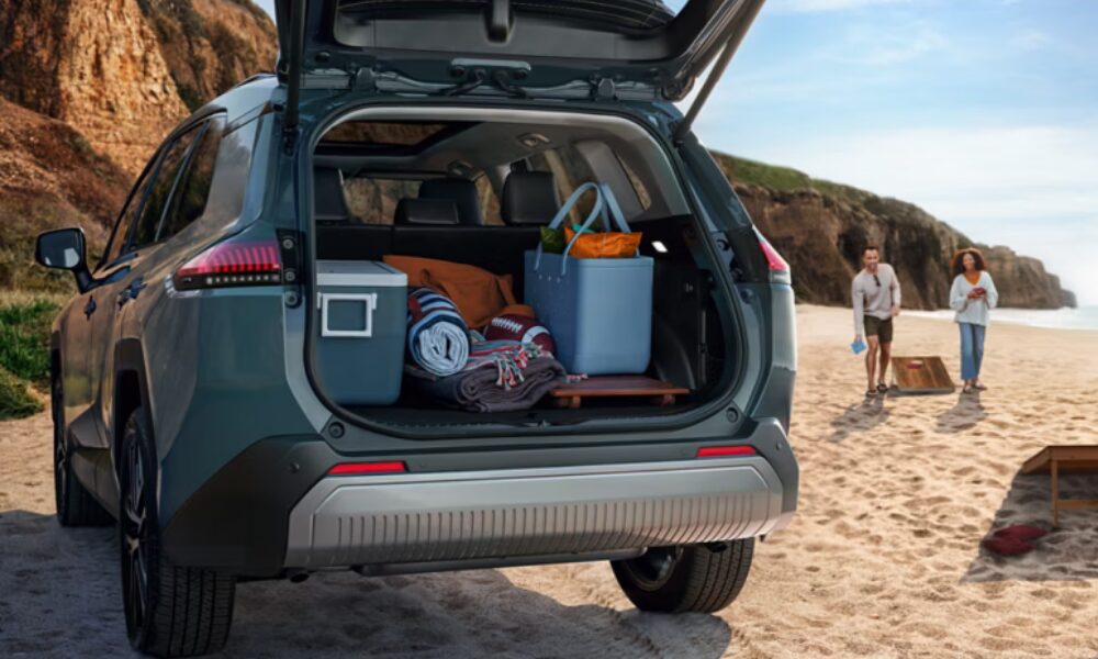 2026 Toyota RAV4 cargo area with rear seats upright showing trunk capacity and space layout.
