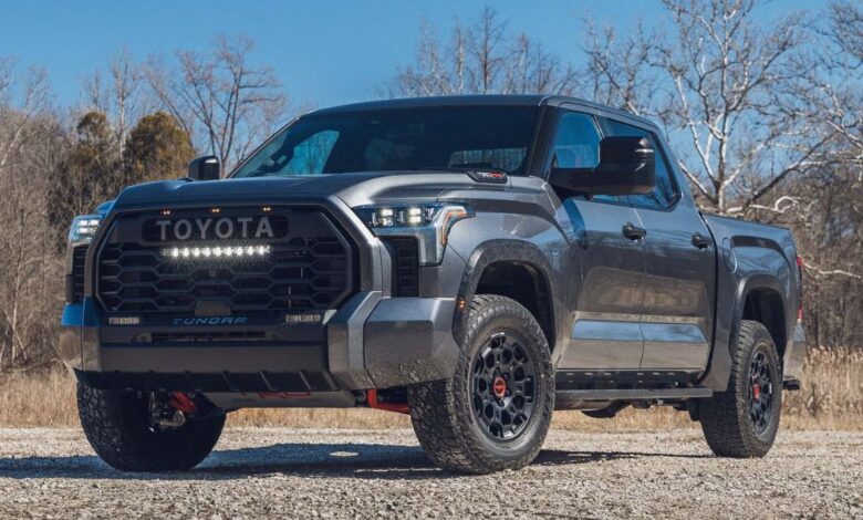 2026 Toyota Tundra front view, massive grille and sharp LED headlights.