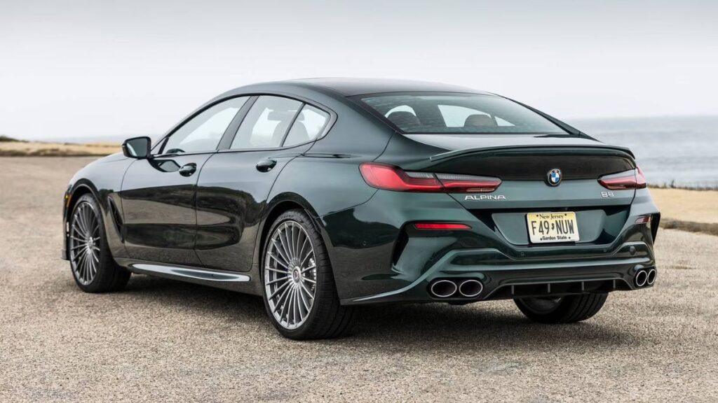 2023 BMW Alpina B8 Gran Coupe rear view with LED taillights and quad exhaust outlets