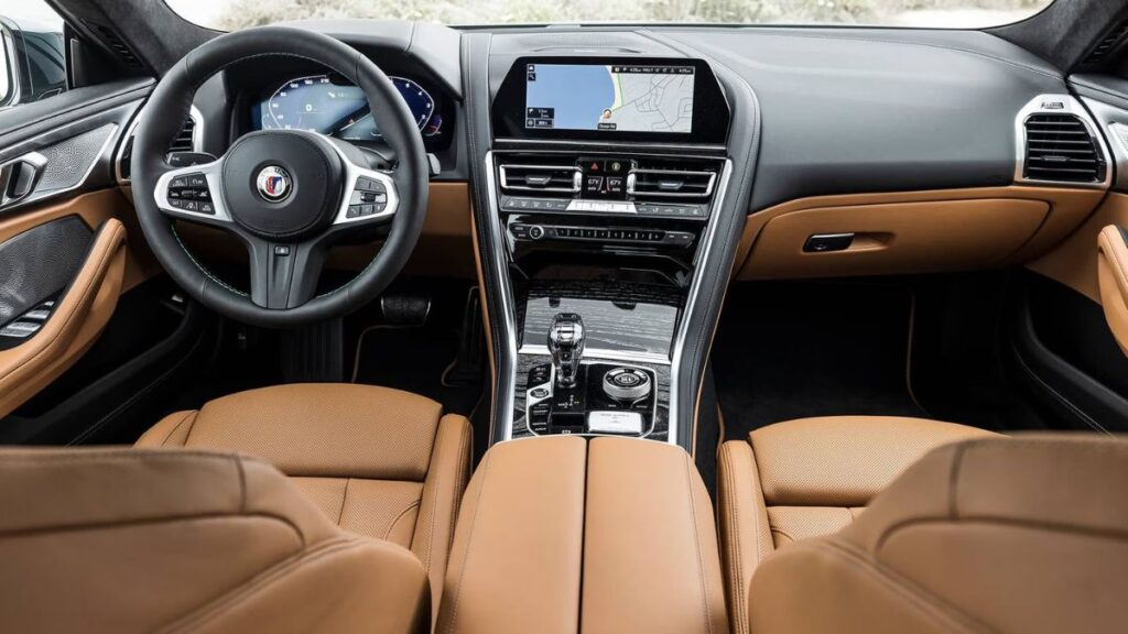 2023 BMW Alpina B8 Gran Coupe interior featuring premium leather and digital displays
