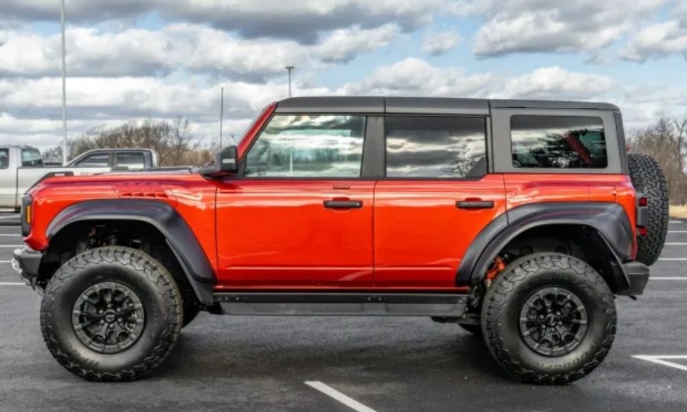 2023 Ford Bronco Raptor side profile in desert terrain