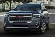 2023 GMC Acadia front three-quarter view showcasing premium SUV styling