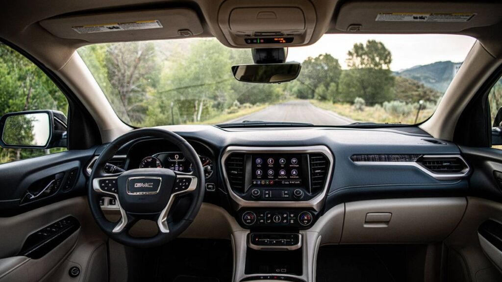 2023 GMC Acadia interior with touchscreen infotainment system and premium seating