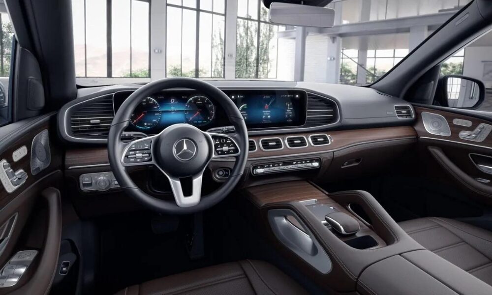 2023 Mercedes-Benz GLE interior featuring dual digital displays, premium materials, and ambient lighting