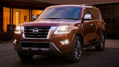 2023 Nissan Armada front view showcasing bold grille and full-size SUV styling