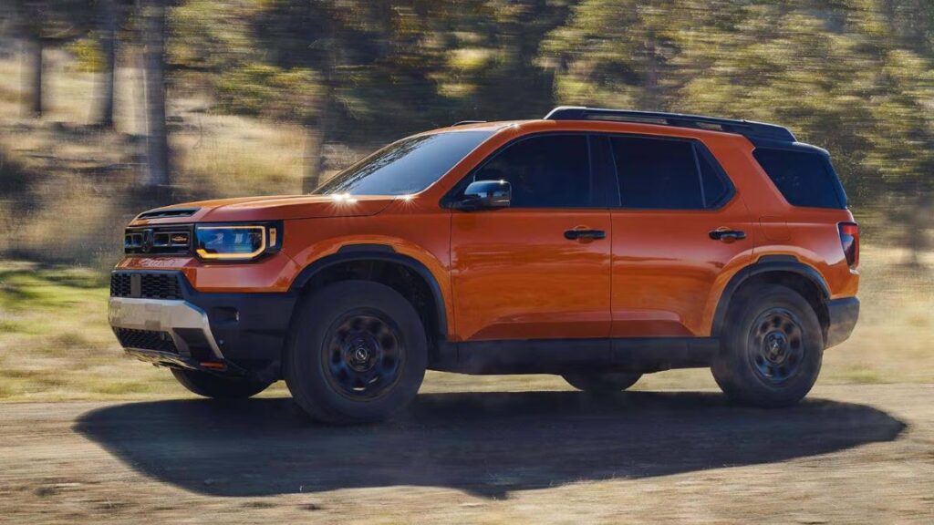 2026 Honda Passport side profile on a gravel trail