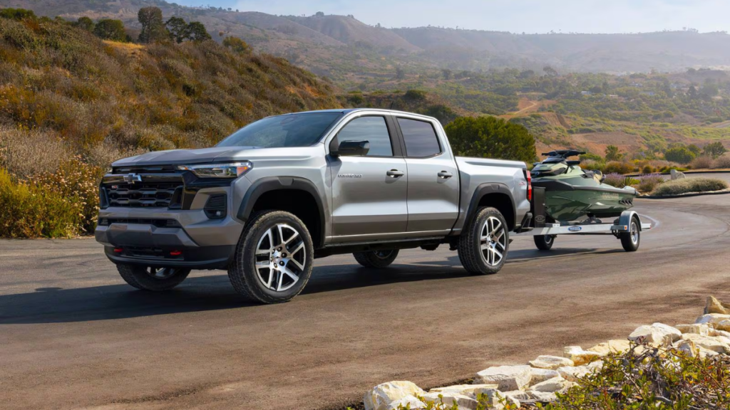 Midsize pickup truck towing a trailer